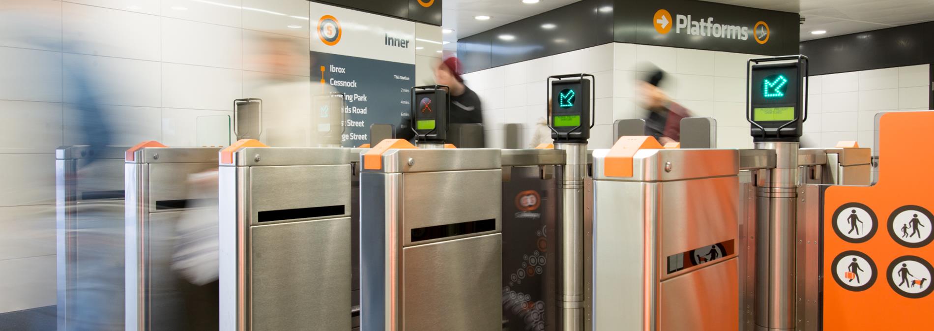Customers using ticket gates